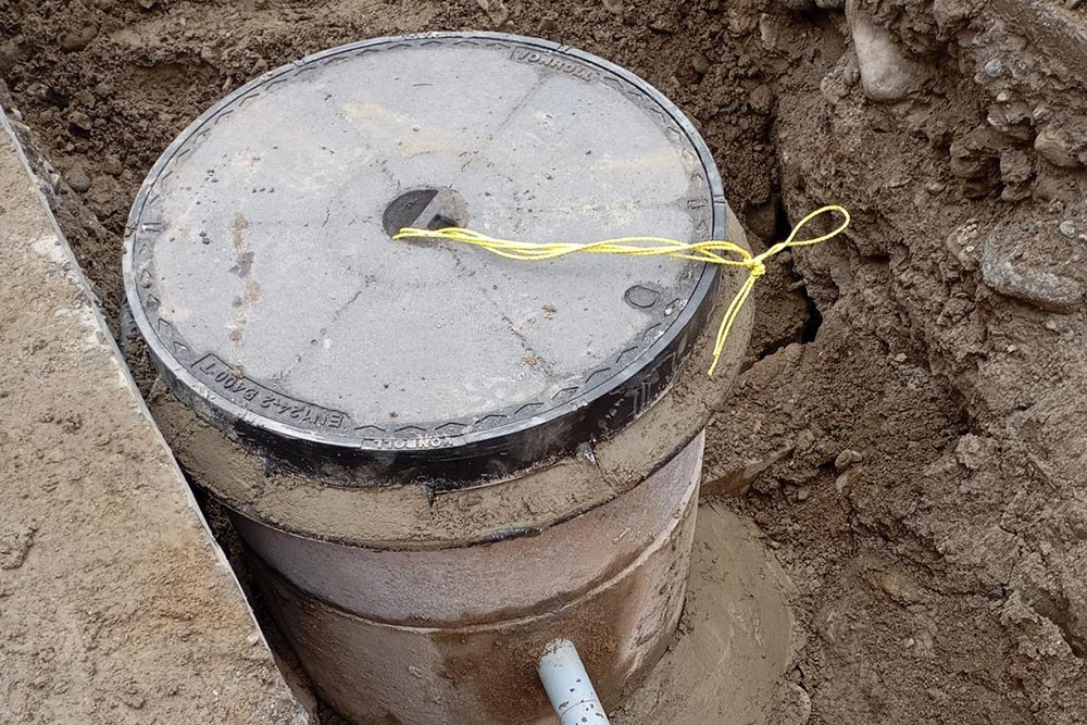 realizzazione di pozzetto in strada