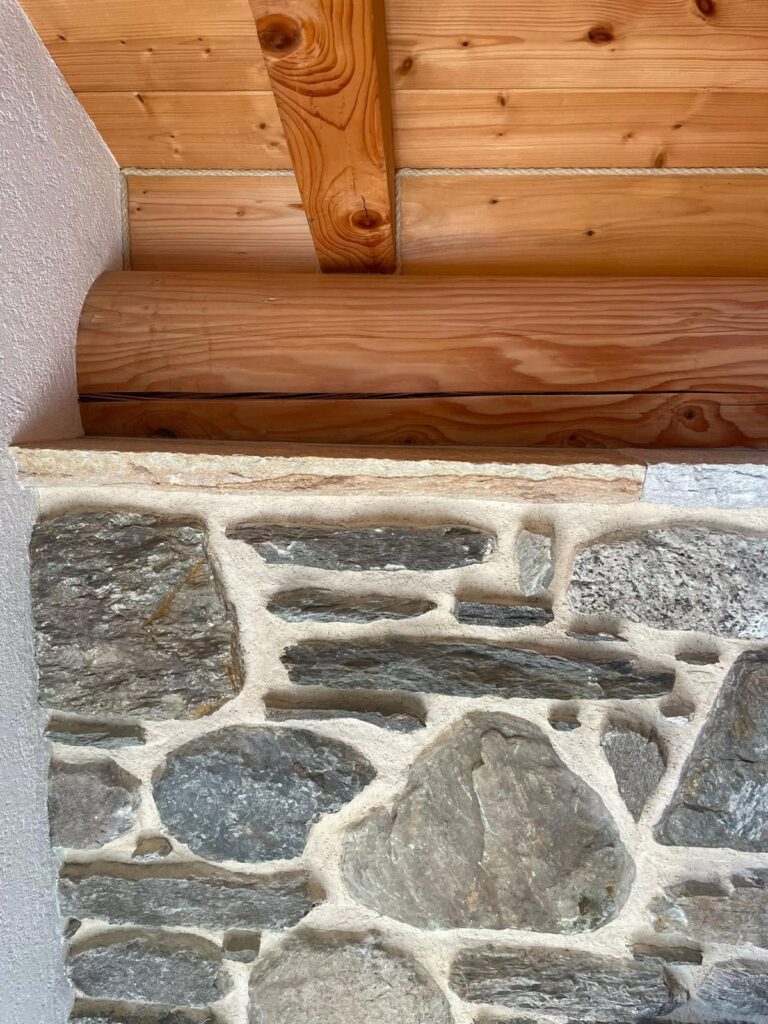 legno e sasso in nuova abitazione